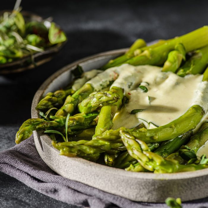 Boiled,asparagus,with,cream,cheese,sauce.,high,quality,photo