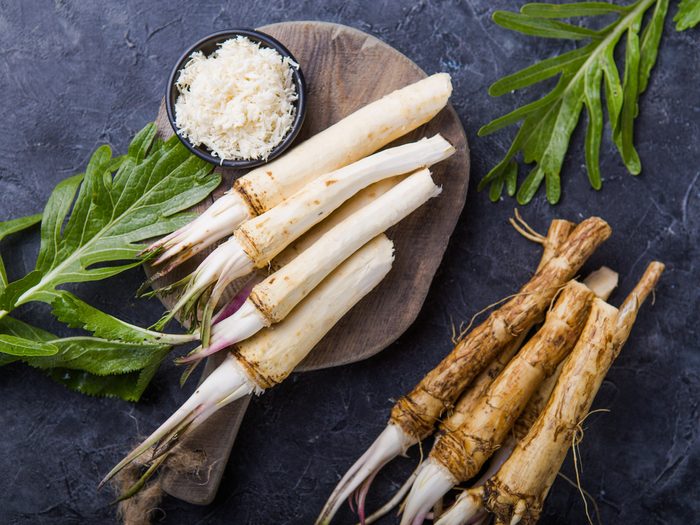 Fresh,orgaanic,horseradish,or,horse Radish,root,on,wooden,cutting,board.