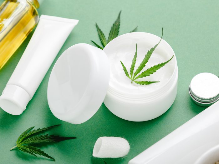 Hemp,moisturizing,cream,in,white,jar,with,cbd,oil,cannabis