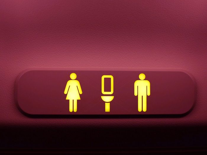 Pink Toilet Sign On Airplane