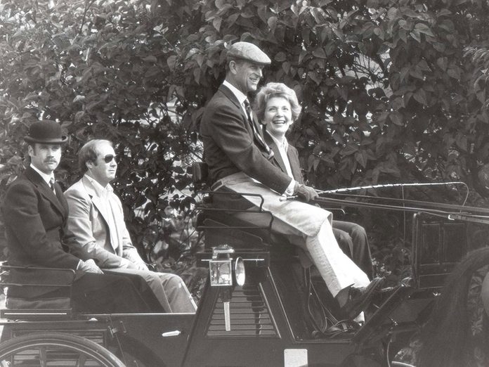 Le prince Philip lors d'une ballade avec la Première dame Nancy Reagan.