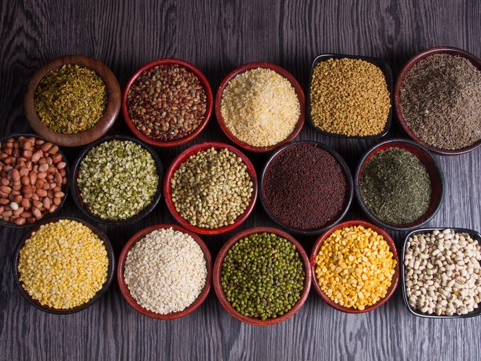 Various,bowls,of,spices,over,wooden,background.,colours,and,textures