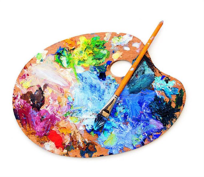 Colourful Artists Oil Paint Palette And Brush On White