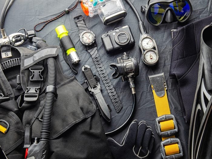 Full,set,of,scuba,diving,equipment,fins,,regulator/octopus,,depth,gauge,