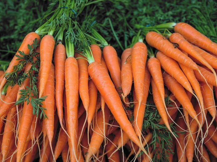 Fresh Carrot Bunches In Open Air Market