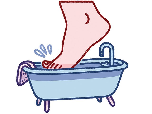 Une illustration d'un pied dans un bain.